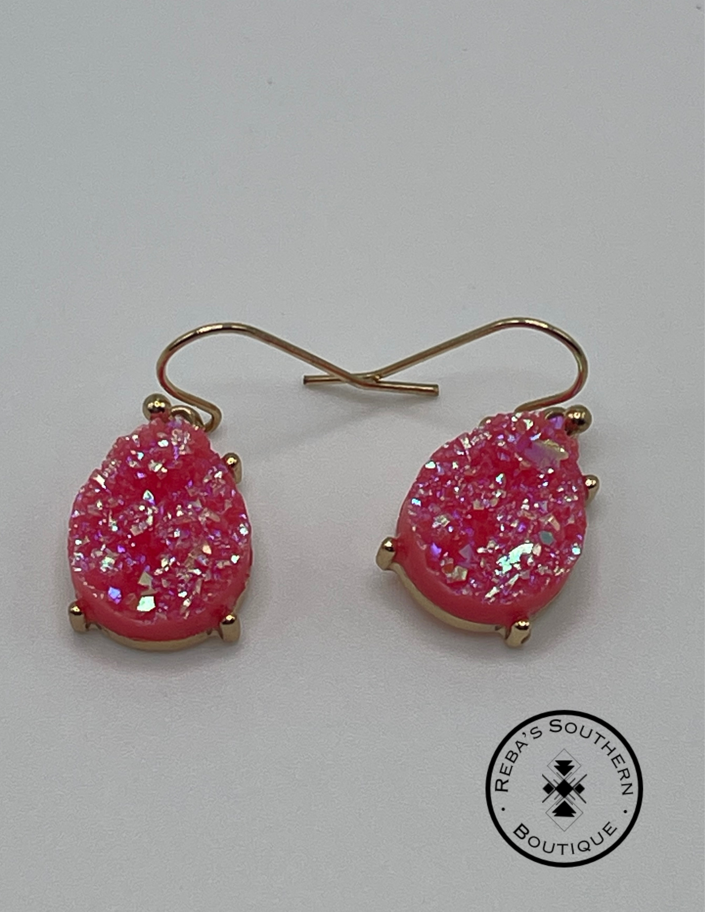 Pink stone wrapped in gold fishhook earrings